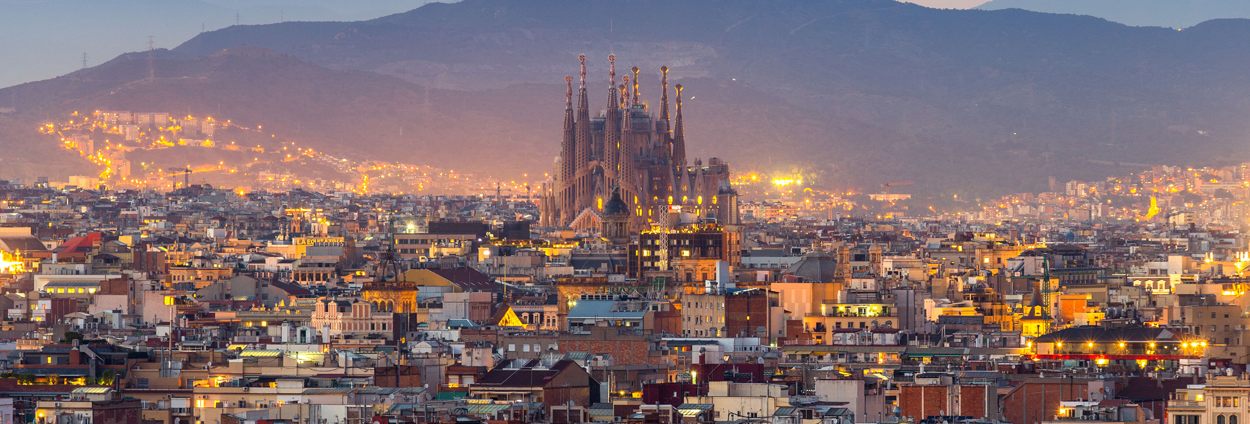 Warm evening light over a historic Spanish city